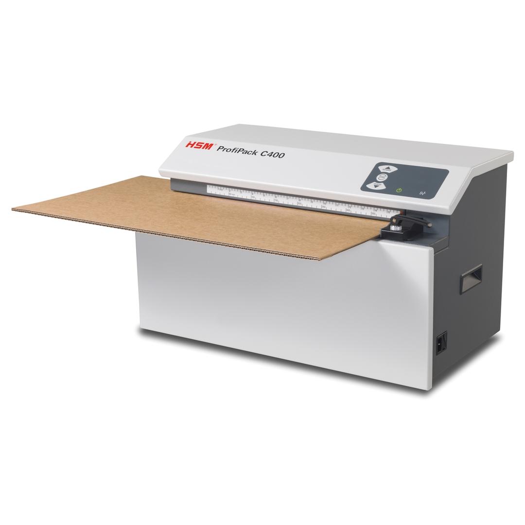 Matelasseur de cartons pour calage ProfiPack C400 HSM — Vue de gauche en fonctionnement